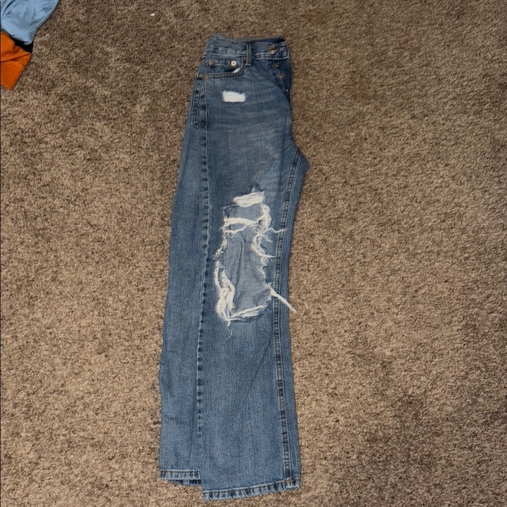 Distressed Blue Jeans